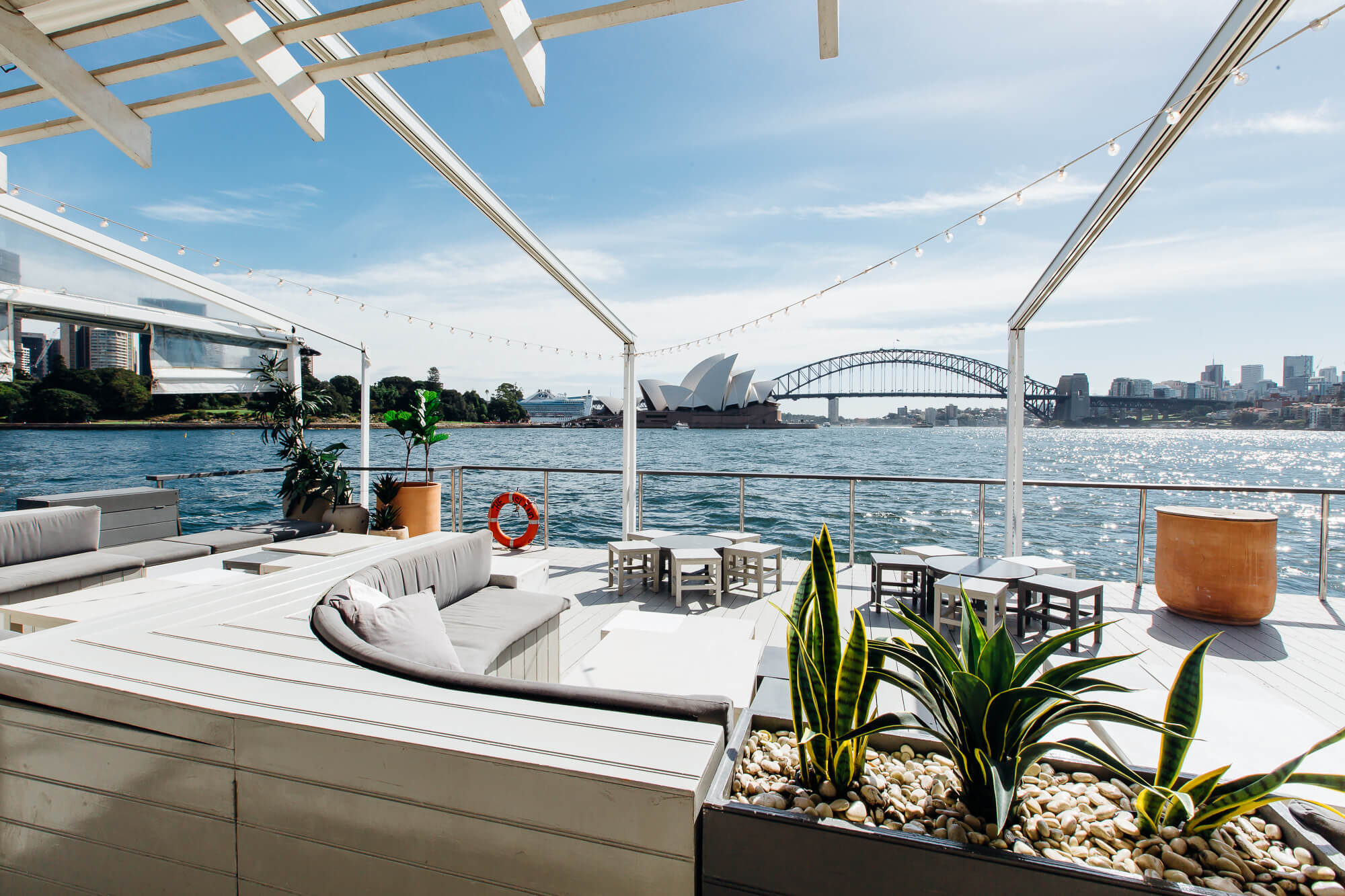 The Island’s open-air lounge overlooking the Sydney Opera House and Harbour Bridge